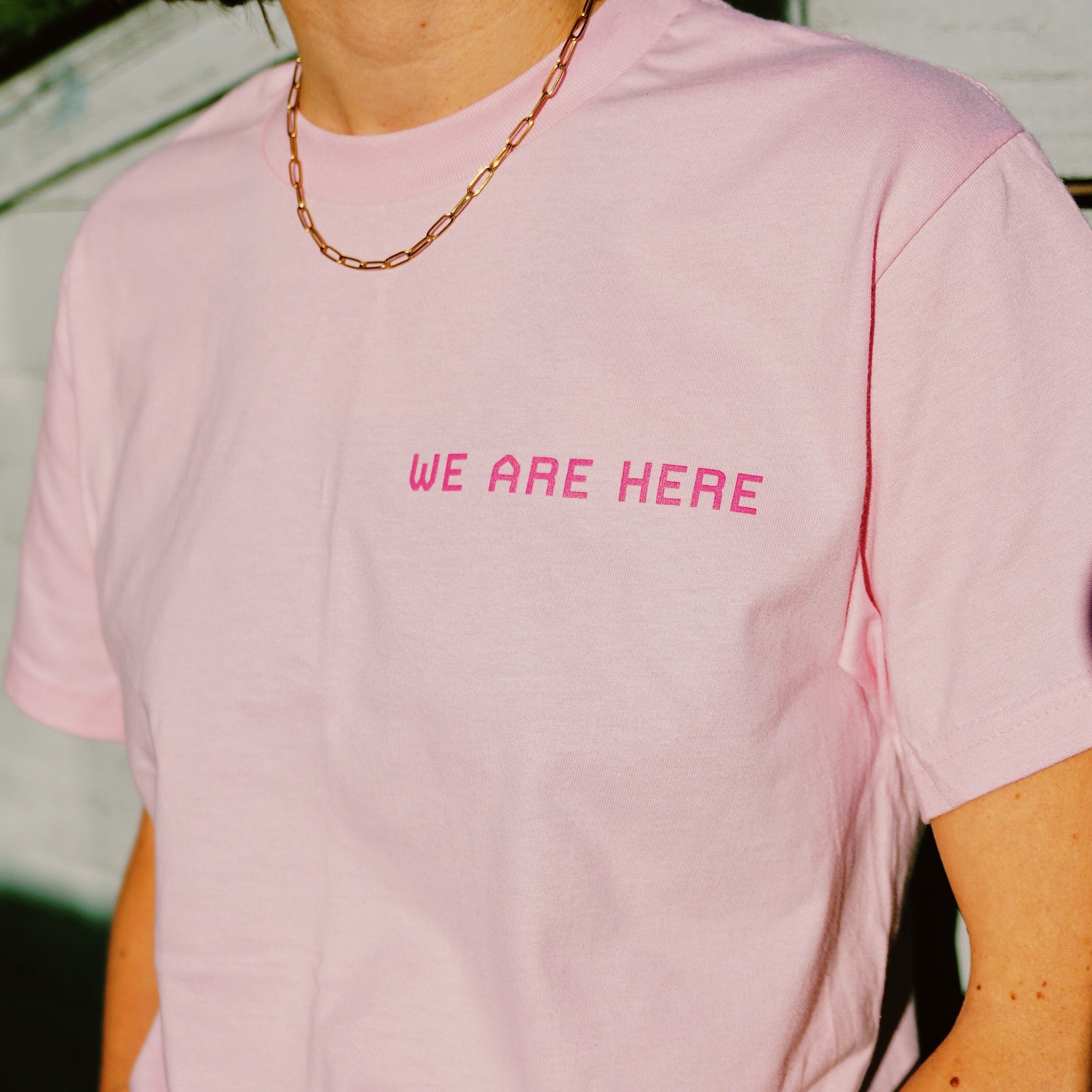 We Are Here - Neon Pink T-Shirt